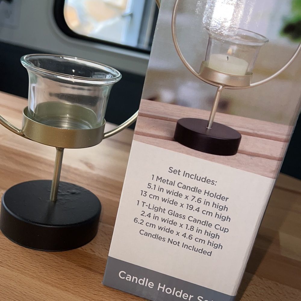 BRAND NEW without BOX               CANDLE HOLDER SET. NEVER BEEN USED.